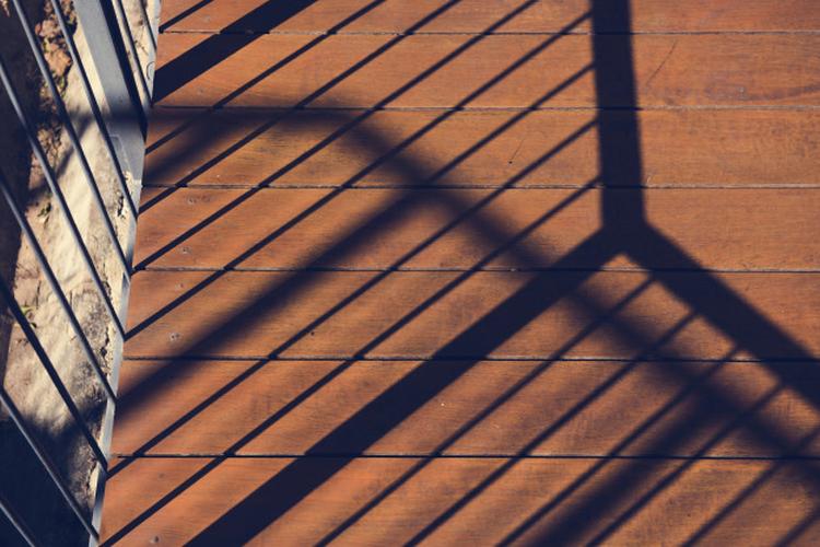 photo of sunshine to the balcony and reflection the shadow on wo 53876 23259