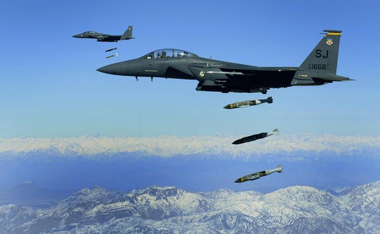 large 335th Fighter Squadron F 15E s drop JDAM s on an insurgent cave