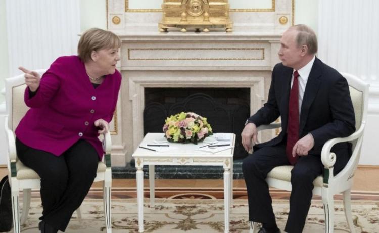merkel putin EPA